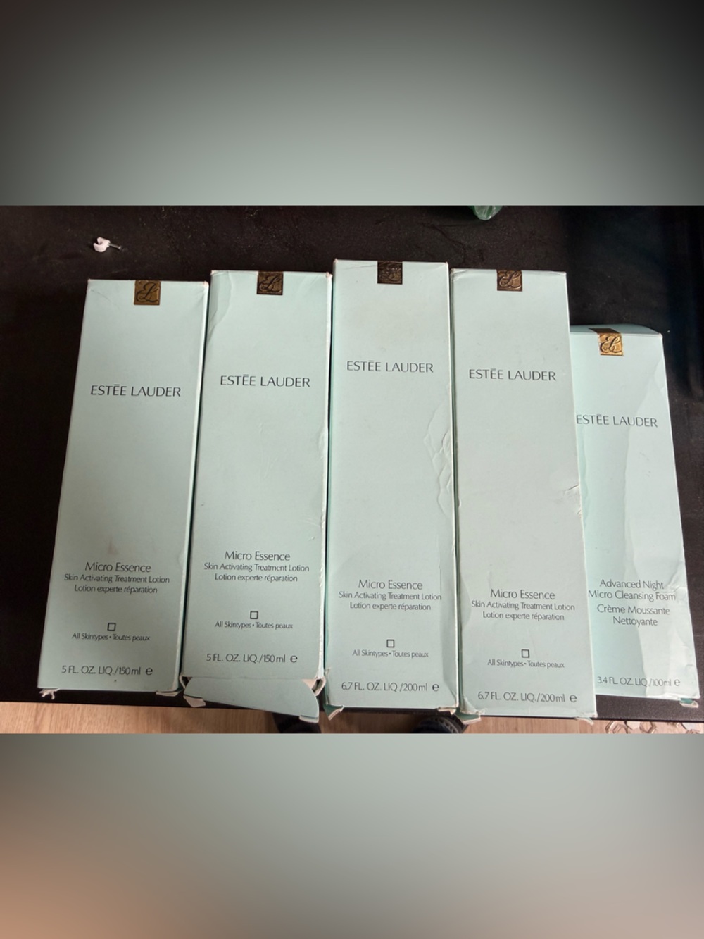 Estee Lauder Micro Essence Lotion in Pale Aqua with Gold Accents NEW sealed bott